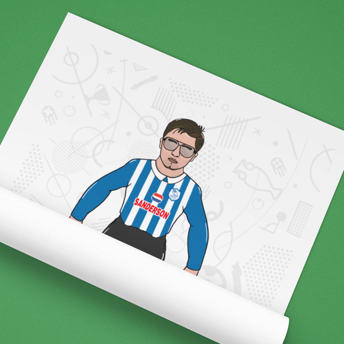 Roll of paper with a printed design of a person wearing a blue and white striped shirt on a green background