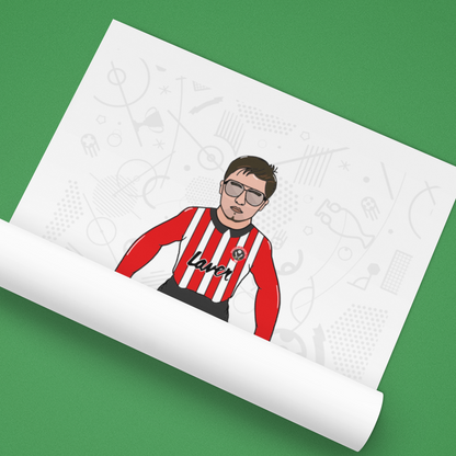 Roll of paper with a printed design of a person wearing a red and black striped shirt on a green background